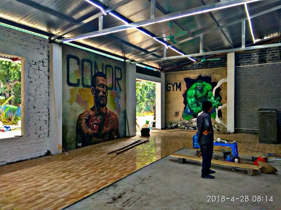 vẽ tranh tường graffiti trang trí phòng tập gym